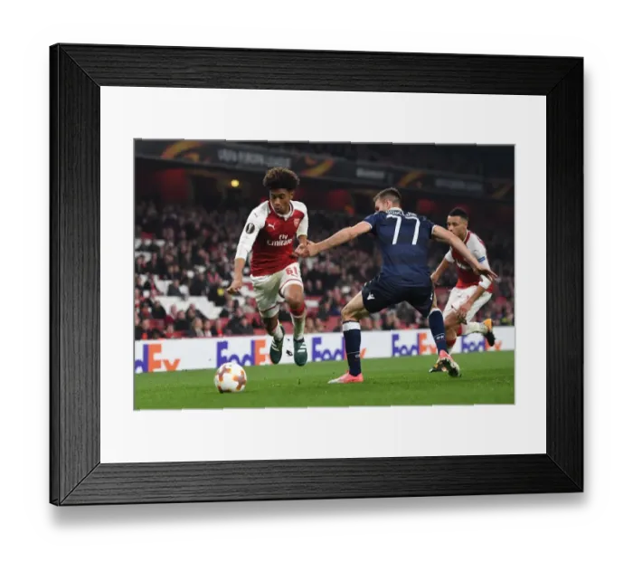 Framed Print : Reiss Nelson vs Marko Gobeljic: Battle at Emirates Stadium - Arsenal FC vs Crvena Zvezda, UEFA Europa League Framed Print : Reiss Nelson vs Marko Gobeljic: Battle at Emirates Stadium - Arsenal FC vs Crvena Zvezda, UEFA Europa League