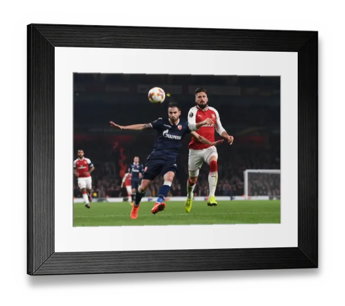 Framed Print : Clash at the Emirates: Olivier Giroud vs. Damien Le Tallec - Arsenal FC vs. Crvena Zvezda, UEFA Europa League Framed Print : Clash at the Emirates: Olivier Giroud vs. Damien Le Tallec - Arsenal FC vs. Crvena Zvezda, UEFA Europa League