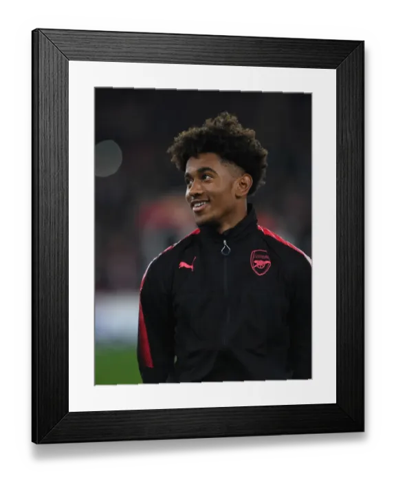 Framed Print : Reiss Nelson Readies for Arsenal's Europa League Clash Against Red Star Belgrade
