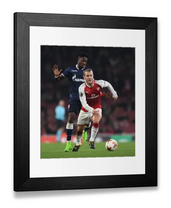 Framed Print : Jack Wilshere vs. Richmond Donald: Arsenal's Midfield Battle in Europa League Clash Framed Print : Jack Wilshere vs. Richmond Donald: Arsenal's Midfield Battle in Europa League Clash