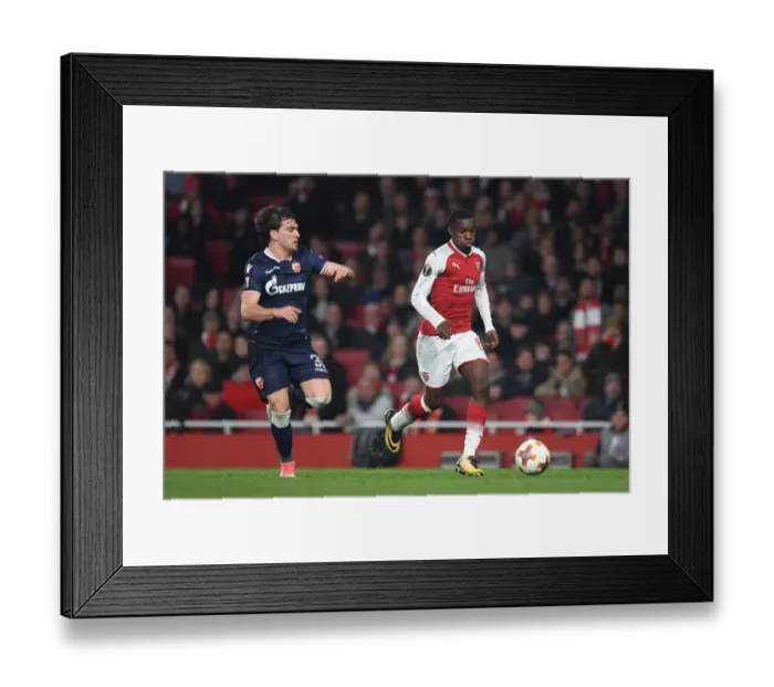 Framed Print : Intense Showdown: Nketiah vs. Stocjkovic in Arsenal's Europa League Battle Framed Print : Intense Showdown: Nketiah vs. Stocjkovic in Arsenal's Europa League Battle