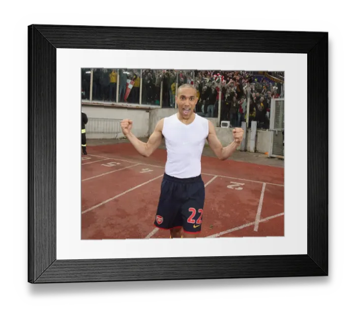 Framed Print : Gael Clichy's Euphoric Moment: Arsenal's Penalty Shootout Victory Over AS Roma in the UEFA Champions League Framed Print : Gael Clichy's Euphoric Moment: Arsenal's Penalty Shootout Victory Over AS Roma in the UEFA Champions League