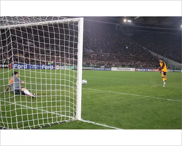 Denilson (Arsenal) shoots past Roma goalkeeper Doni