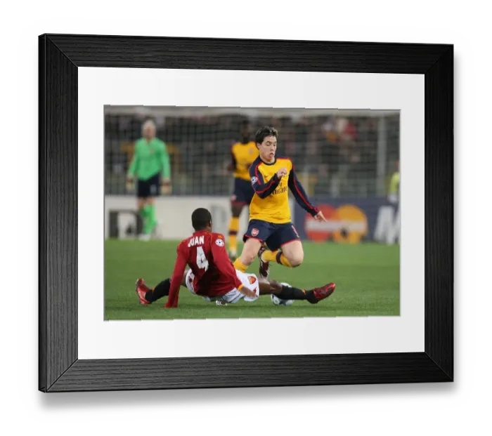 Framed Print : Nasri Face-off: Arsenal's Samir vs. Roma's Juan in UEFA Champions League Thriller Framed Print : Nasri Face-off: Arsenal's Samir vs. Roma's Juan in UEFA Champions League Thriller