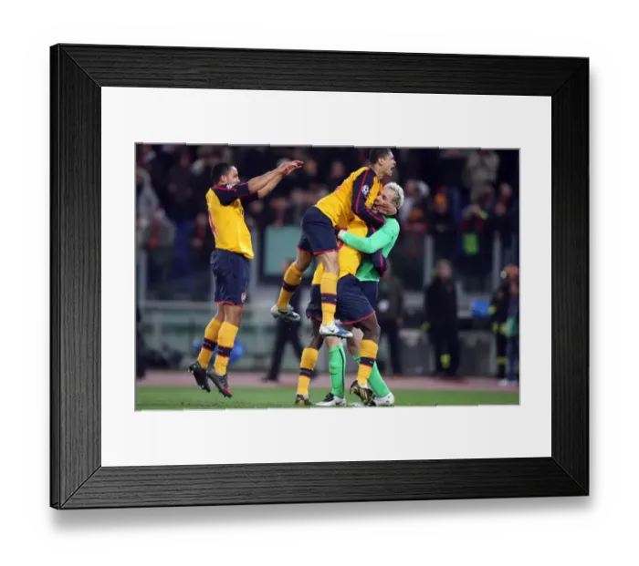 Framed Print : Manuel Almunia and Arsenal Teammates Celebrate Penalty Shootout Victory over AS Roma in UEFA Champions League