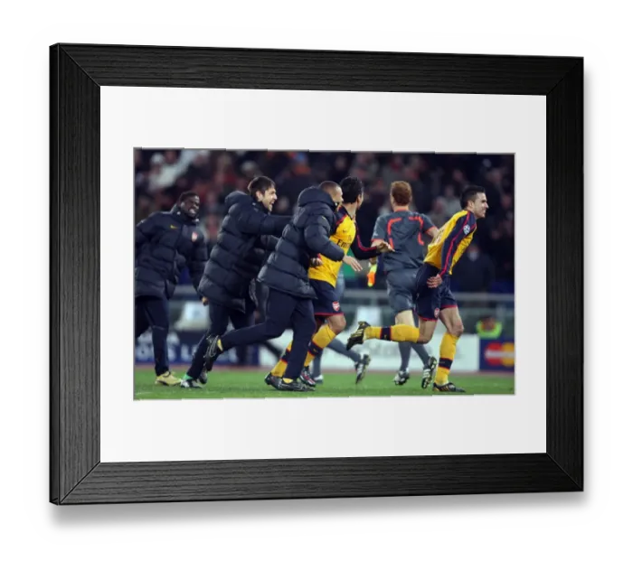 Framed Print : Arsenal's Champions League Victory: Robin van Persie and Team Celebrate Penalty Shootout Win Against AS Roma Framed Print : Arsenal's Champions League Victory: Robin van Persie and Team Celebrate Penalty Shootout Win Against AS Roma
