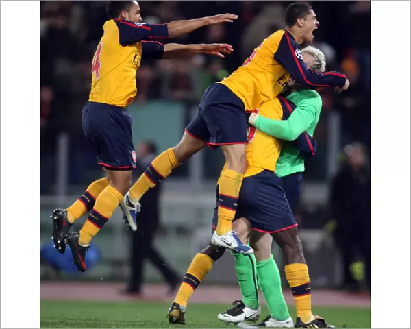 Manuel Almunia celebrates Arsenal winning the penalty