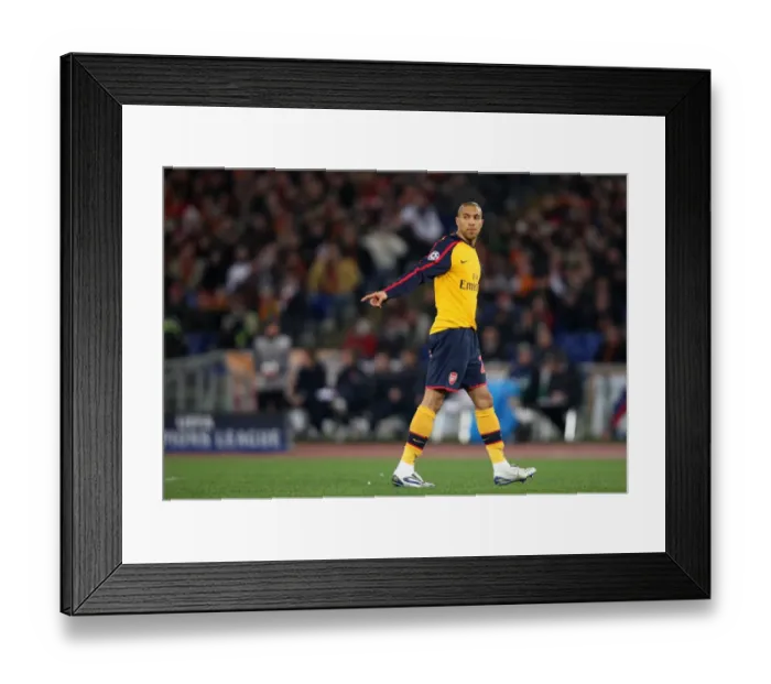 Framed Print : Gael Clichy in UEFA Champions League Drama: Arsenal vs. AS Roma (1:0, 6:7 after Penalty Shootout) Framed Print : Gael Clichy in UEFA Champions League Drama: Arsenal vs. AS Roma (1:0, 6:7 after Penalty Shootout)