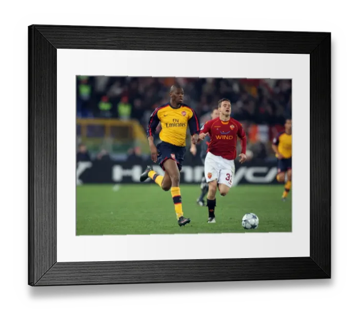 Framed Print : Abou Diaby (Arsenal) Matteo Brighi (Roma) Framed Print : Abou Diaby (Arsenal) Matteo Brighi (Roma)