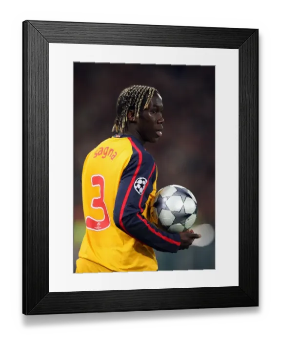 Framed Print : Bacary Sagna's Dramatic UEFA Champions League Showdown: Arsenal vs. AS Roma (1:0, 6:7 after Penalty Shootout)