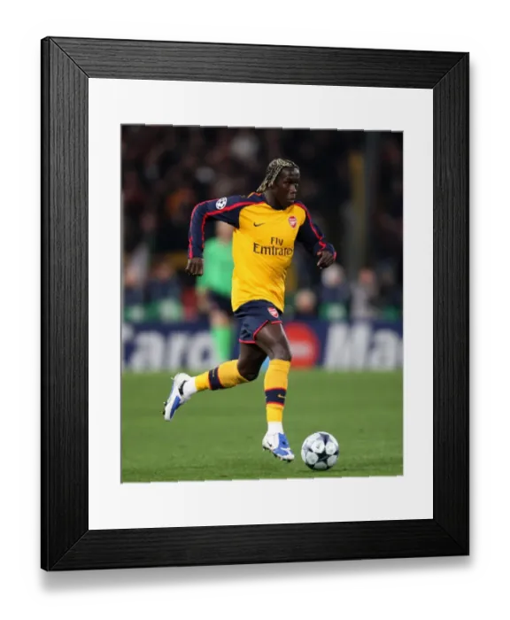 Framed Print : Dramatic UEFA Champions League Showdown: Arsenal vs. AS Roma - Bacary Sagna's Penalty Heartbreak