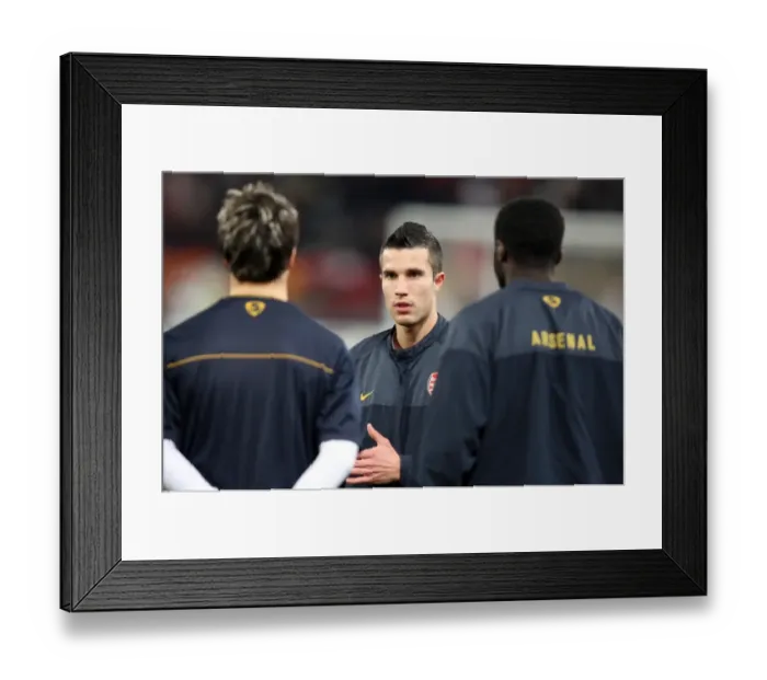 Framed Print : Robin van Persie (Arsenal) talks to his team mates during the warm up Framed Print : Robin van Persie (Arsenal) talks to his team mates during the warm up