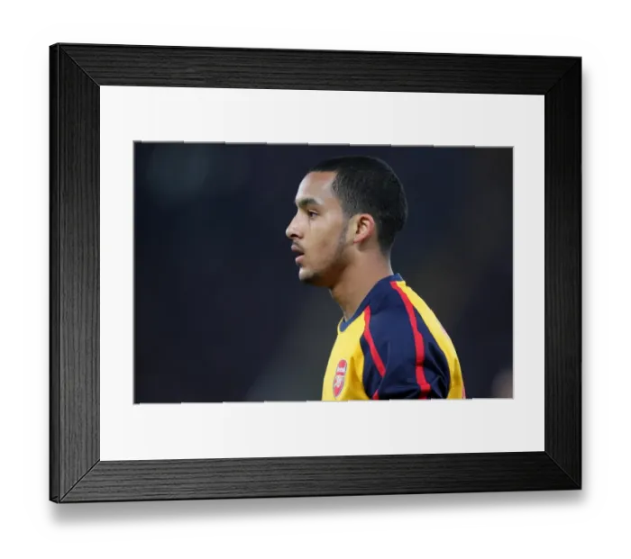 Framed Print : Dramatic Penalty Miss: Theo Walcott and Arsenal's Heartbreaking UEFA Champions League Exit vs. AS Roma Framed Print : Dramatic Penalty Miss: Theo Walcott and Arsenal's Heartbreaking UEFA Champions League Exit vs. AS Roma