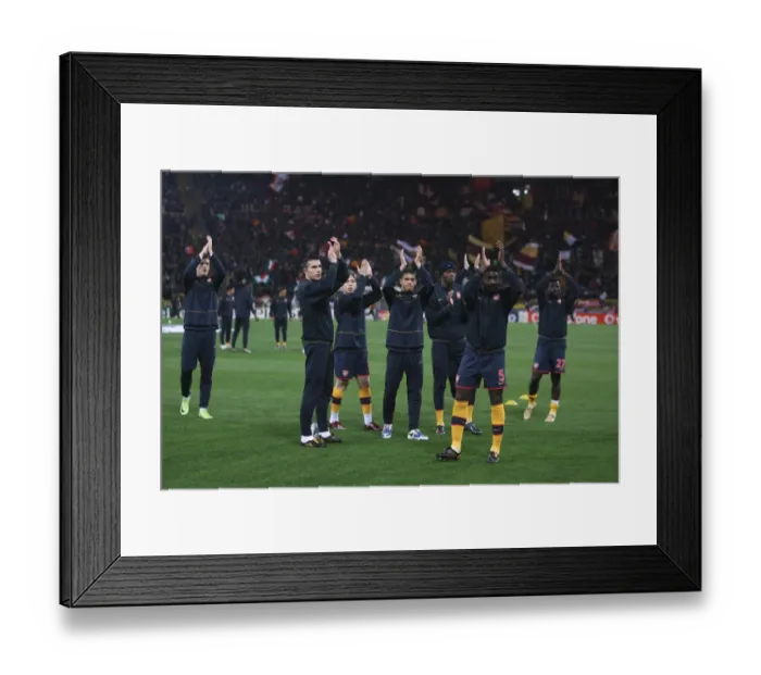 Framed Print : The Arsenal team wave to the fans before the match
