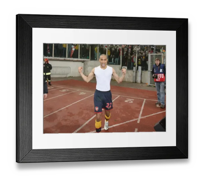 Framed Print : Gael Clichy's Euphoric Moment: Arsenal's Penalty Shootout Victory over AS Roma in the UEFA Champions League Framed Print : Gael Clichy's Euphoric Moment: Arsenal's Penalty Shootout Victory over AS Roma in the UEFA Champions League