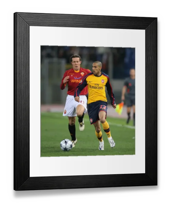 Framed Print : Gael Clichy (Arsenal) Rodrigo Taddei (Roma) Framed Print : Gael Clichy (Arsenal) Rodrigo Taddei (Roma)