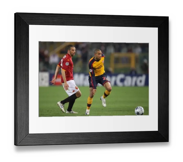 Framed Print : Gael Clichy (Arsenal) Max Tonetto (Roma) Framed Print : Gael Clichy (Arsenal) Max Tonetto (Roma)