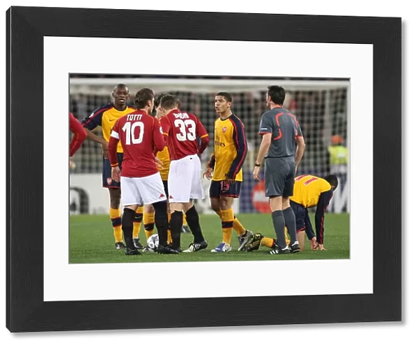 Denilson vs. Totti: Clash in the UEFA Champions League Showdown at Stadio Olympico, Arsenal vs. AS Roma (2009)