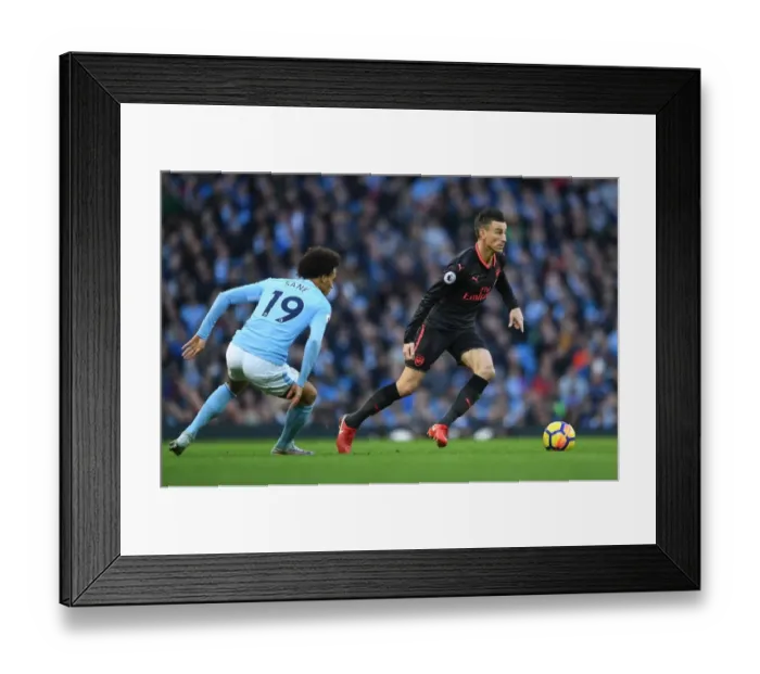 Framed Print : Koscielny vs Sane: Battle at the Etihad - Manchester City vs Arsenal, Premier League 2017-18 Framed Print : Koscielny vs Sane: Battle at the Etihad - Manchester City vs Arsenal, Premier League 2017-18