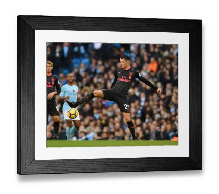 Framed Print : Granit Xhaka: Arsenal Midfielder in Action Against Manchester City (2017-18)