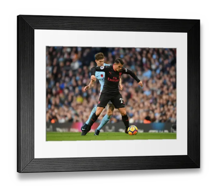 Framed Print : Xhaka vs. Stones: A Midfield Battle - Manchester City vs. Arsenal, Premier League 2017-18 Framed Print : Xhaka vs. Stones: A Midfield Battle - Manchester City vs. Arsenal, Premier League 2017-18