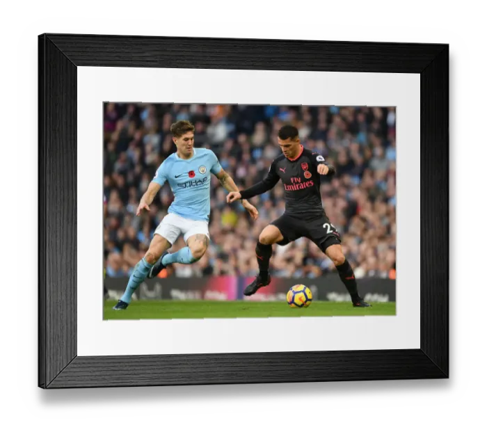 Framed Print : Xhaka vs Stones: A Midfield Showdown - Manchester City vs Arsenal, Premier League 2017-18