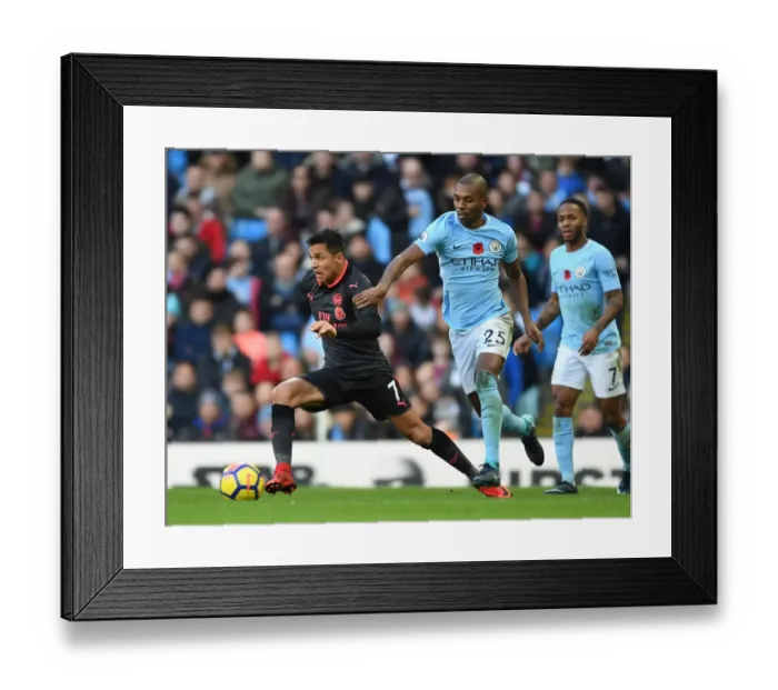 Framed Print : Alexis Sanchez vs. Fernandinho: A Premier League Showdown at the Etihad