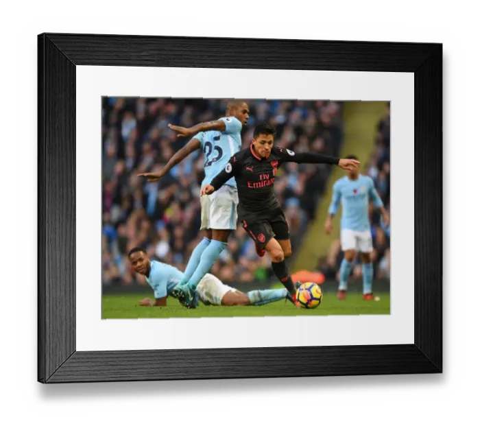 Framed Print : Alexis Sanchez vs Fernandinho: A Premier League Showdown at the Etihad