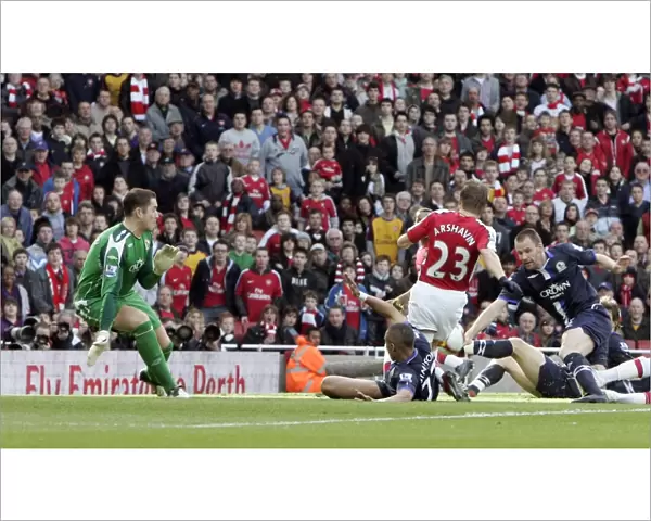 Andrey Arshavin scores his and Arsenals 1st goal past Paul Robinson