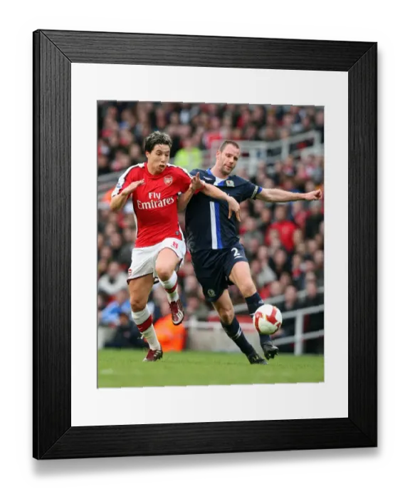 Framed Print : Samir Nasri (Arsenal) Andre Ooijer (Blackburn) Framed Print : Samir Nasri (Arsenal) Andre Ooijer (Blackburn)