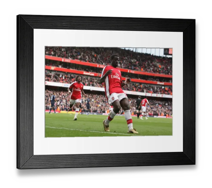 Framed Print : Emmanuel Eboue celebrates scoring the 4th Arsenal goal Framed Print : Emmanuel Eboue celebrates scoring the 4th Arsenal goal