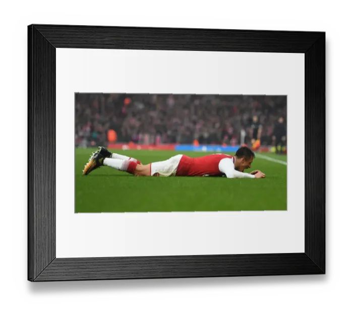 Framed Print : Arsenal's Alexis Sanchez Faces Off Against Tottenham in Intense Premier League Showdown