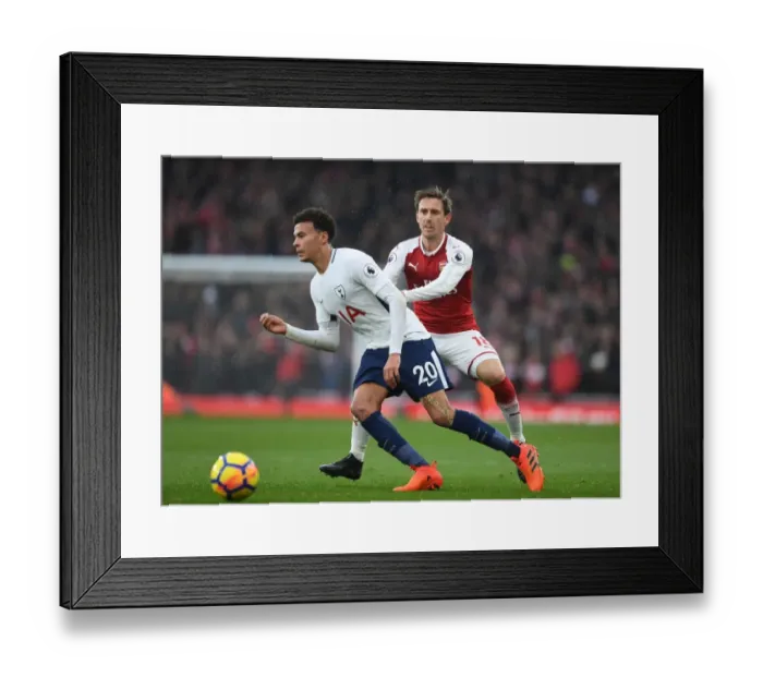 Framed Print : Clash at the Emirates: Monreal vs Alli in the Arsenal vs Tottenham Rivalry Framed Print : Clash at the Emirates: Monreal vs Alli in the Arsenal vs Tottenham Rivalry