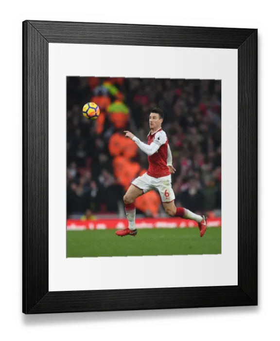 Framed Print : Arsenal vs. Tottenham: Koscielny's Battle in the Heart of the Action (2017-18) Framed Print : Arsenal vs. Tottenham: Koscielny's Battle in the Heart of the Action (2017-18)