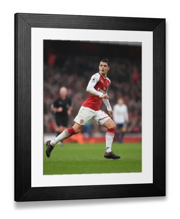 Framed Print : Granit Xhaka: Arsenal vs. Tottenham Clash in the Premier League
