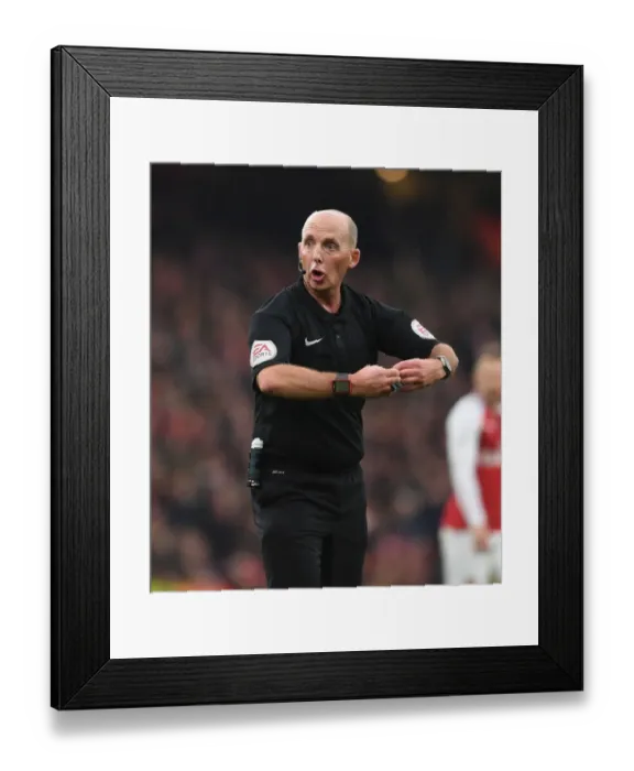 Framed Print : Mike Dean Overssees Tense Arsenal v Tottenham Clash in Premier League