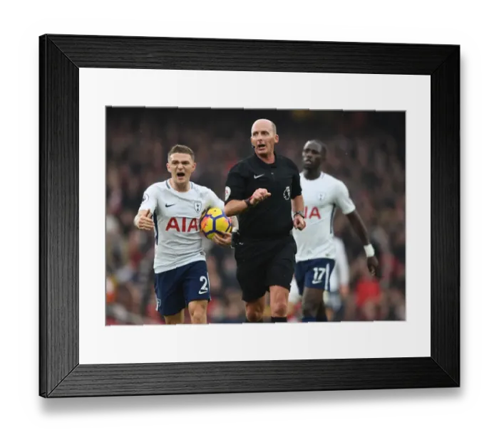Framed Print : Mike Dean Overssees Tense Arsenal vs. Tottenham Clash in Premier League