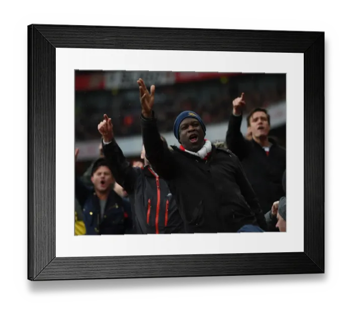 Framed Print : Arsenal vs. Tottenham: Passionate Arsenal Fan at Emirates Stadium