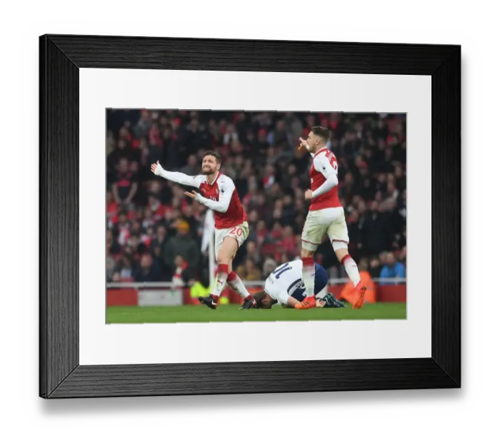 Framed Print : Arsenal vs. Tottenham: Mustafi and Kane Clash in Intense Premier League Rivalry