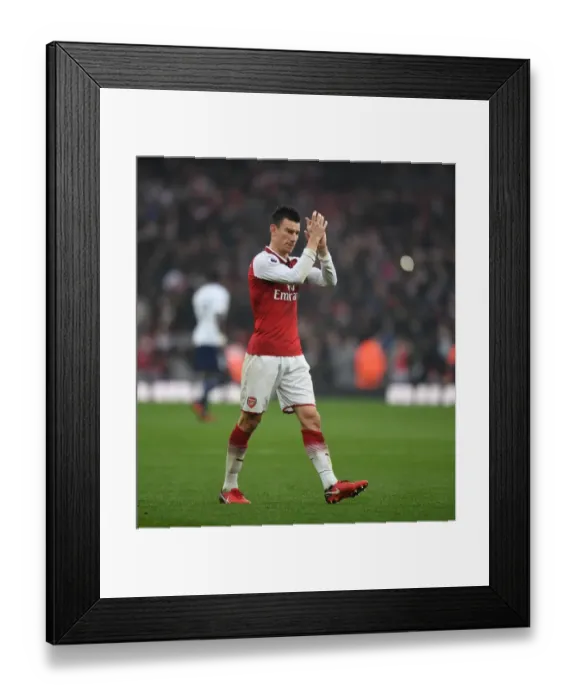 Framed Print : Arsenal's Laurent Koscielny Celebrates with Fans after Arsenal vs. Tottenham Match