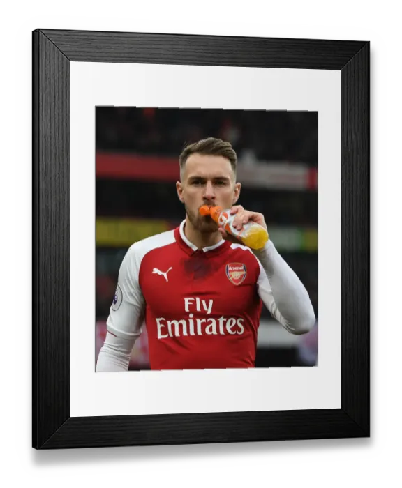 Framed Print : Aaron Ramsey Prepares for Arsenal-Tottenham Clash with Gatorade