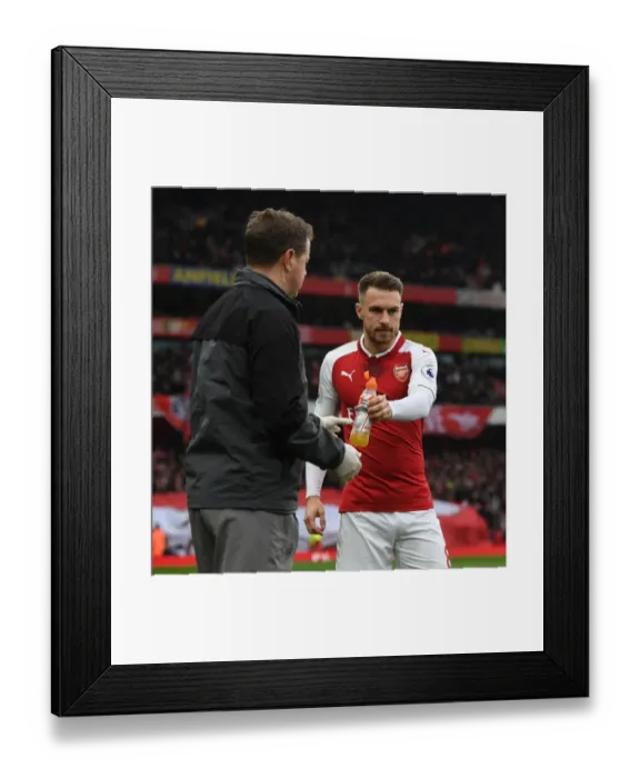 Framed Print : Arsenal's Aaron Ramsey Prepares for Battle against Tottenham in the Premier League