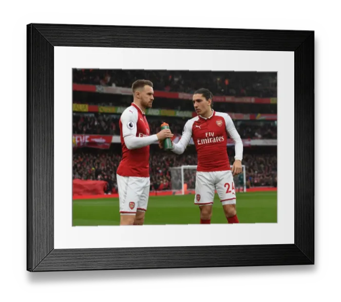 Framed Print : Arsenal Team Camaraderie: Ramsey Supports Bellerin with Gatorade at Arsenal v Tottenham (2017-18) Framed Print : Arsenal Team Camaraderie: Ramsey Supports Bellerin with Gatorade at Arsenal v Tottenham (2017-18)