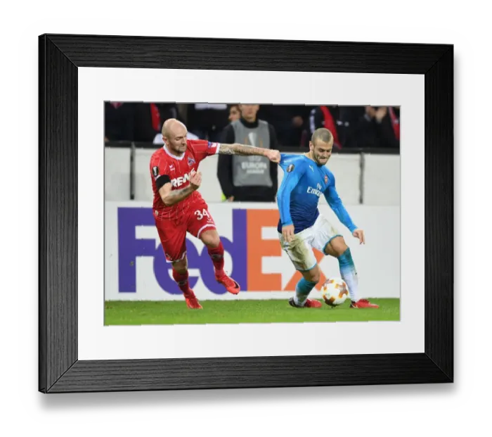 Framed Print : Battle of Midfield: Wilshere vs. Rausch in Arsenal's Europa League Clash Framed Print : Battle of Midfield: Wilshere vs. Rausch in Arsenal's Europa League Clash