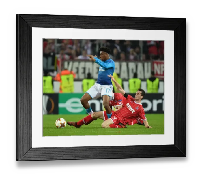 Framed Print : Alex Iwobi Dashes Past Lukas Klunter: Arsenal's Thrilling Moment Against 1. FC Koln in Europa League Framed Print : Alex Iwobi Dashes Past Lukas Klunter: Arsenal's Thrilling Moment Against 1. FC Koln in Europa League