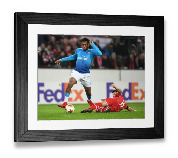 Framed Print : Alex Iwobi Outsmarts Milos Jojic: Arsenal's Europa League Victory Over FC Koln Framed Print : Alex Iwobi Outsmarts Milos Jojic: Arsenal's Europa League Victory Over FC Koln