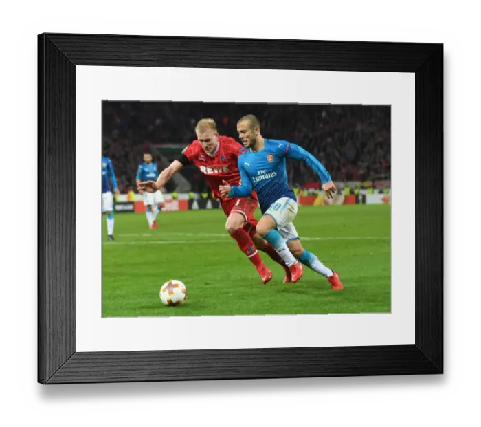 Framed Print : Jack Wilshere Dashes Past Fredrik Sorensen: Arsenal's Europa League Battle against 1. FC Koln Framed Print : Jack Wilshere Dashes Past Fredrik Sorensen: Arsenal's Europa League Battle against 1. FC Koln