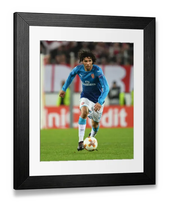 Framed Print : Mohamed Elneny: Arsenal's Midfield Masterclass in Europa League Showdown against 1. FC Koln (2017) Framed Print : Mohamed Elneny: Arsenal's Midfield Masterclass in Europa League Showdown against 1. FC Koln (2017)