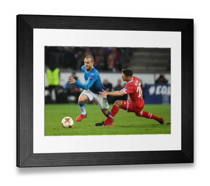 Framed Print : Jack Wilshere Outmaneuvers Salin Ozcan: Arsenal's Europa League Victory Over 1. FC Koln Framed Print : Jack Wilshere Outmaneuvers Salin Ozcan: Arsenal's Europa League Victory Over 1. FC Koln
