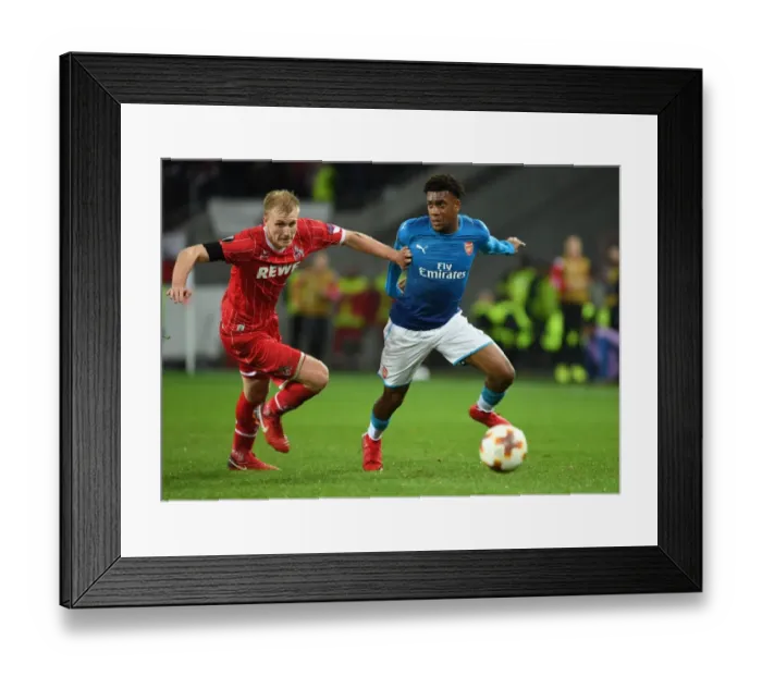 Framed Print : Alex Iwobi Dashes Past Frederik Sorensen: Arsenal's Thrilling Moment against 1. FC Koln in Europa League